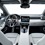 **

"Modern car interior, showcasing a futuristic dashboard with large, high-resolution displays replacing traditional gauges. The scene should depict a driver engaging with the infotainment system, possibly watching a movie or video, highlighting the entertainment options available in a Level 3 autonomous vehicle. The seats are comfortable and adjustable, promoting a relaxed posture. The overall style is sleek and technologically advanced, appealing to a German automotive aesthetic."

**